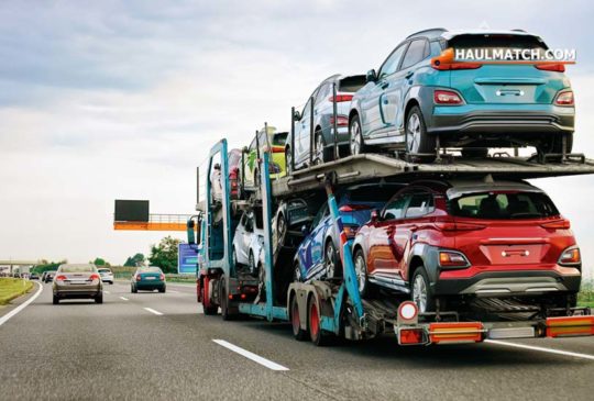 cars_carrier_truck_on_highway